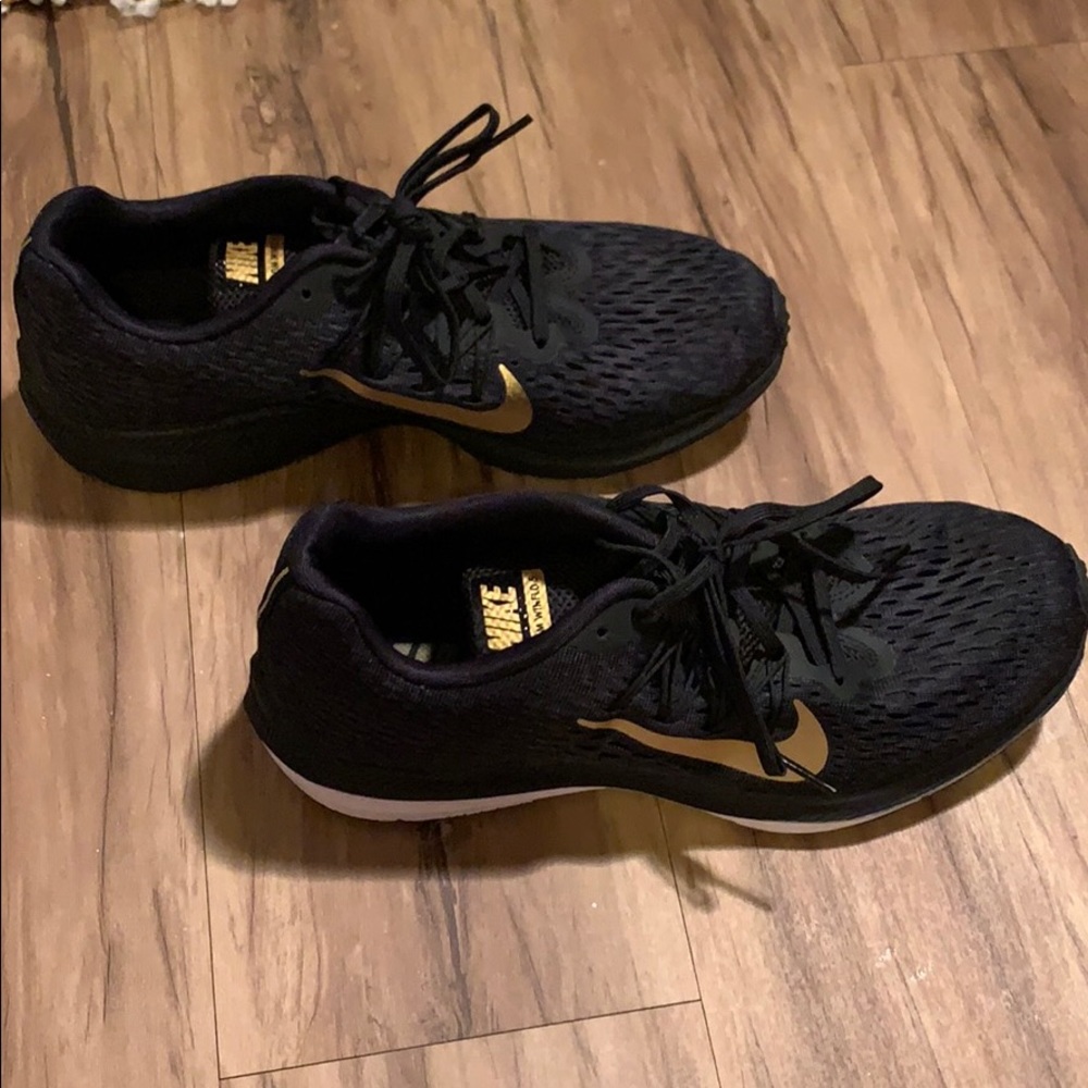 Black and Gold Nike Tennis Shoes